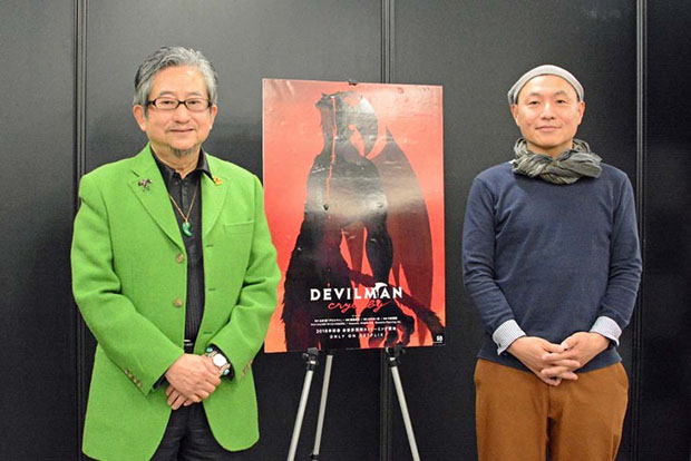 Go Nagai e Masaaki Yuasa davanti al poster di "Devilman Crybaby".