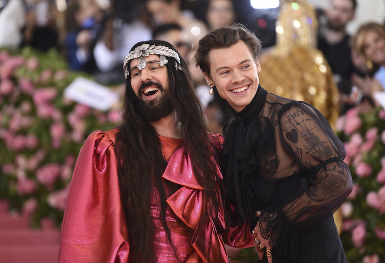 Harry Styles, right, and designer Alessandro Michele attend The Metropolitan Museum of Art's Costume Institute benefit gala celebrating the opening of the "Camp: Notes on Fashion" exhibition on Monday, May 6, 2019, in New York. (Photo by Evan Agostini/Invision/AP).